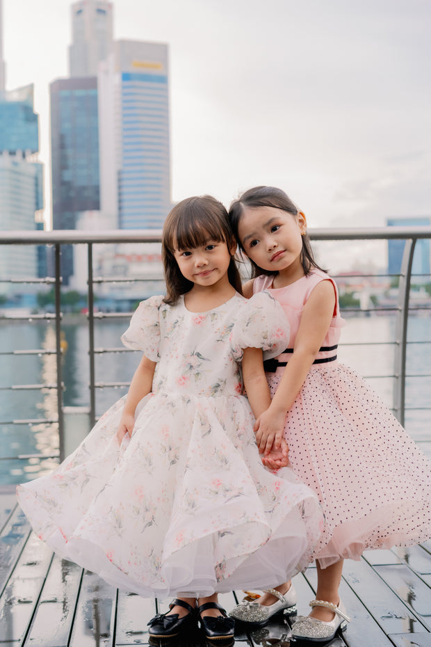 Knee-length apricot tulle dress for girls with a voluminous tulle skirt, black polka dot pattern and two cute ribbons at the waistline. Handmade with love. Occasions: Wedding, Birthday party, Prom, Flower girl, Eid, and other events.