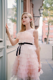 Midi length princess girl dress with ombre effect in white and pink with a ruffled tulle skirt and contrasting black ribbon at the waistline. For special occasions: Wedding, Birthday party, Prom, Flower girl, Eid, and other events.