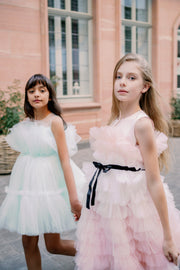 Knee-length elegant girl dress in a light blue colour with a voluminous tulle skirt and top embellished with a pearl ribbon at the waistline. For special occasions: Wedding, Birthday party, Prom, Flower girl, Eid, and other events.