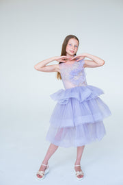 handmade, girl princess dress in purple with a midi-length tulle skirt, transparent top with pearl and flower embroidery and ruffled tulle details, for special occasions.
