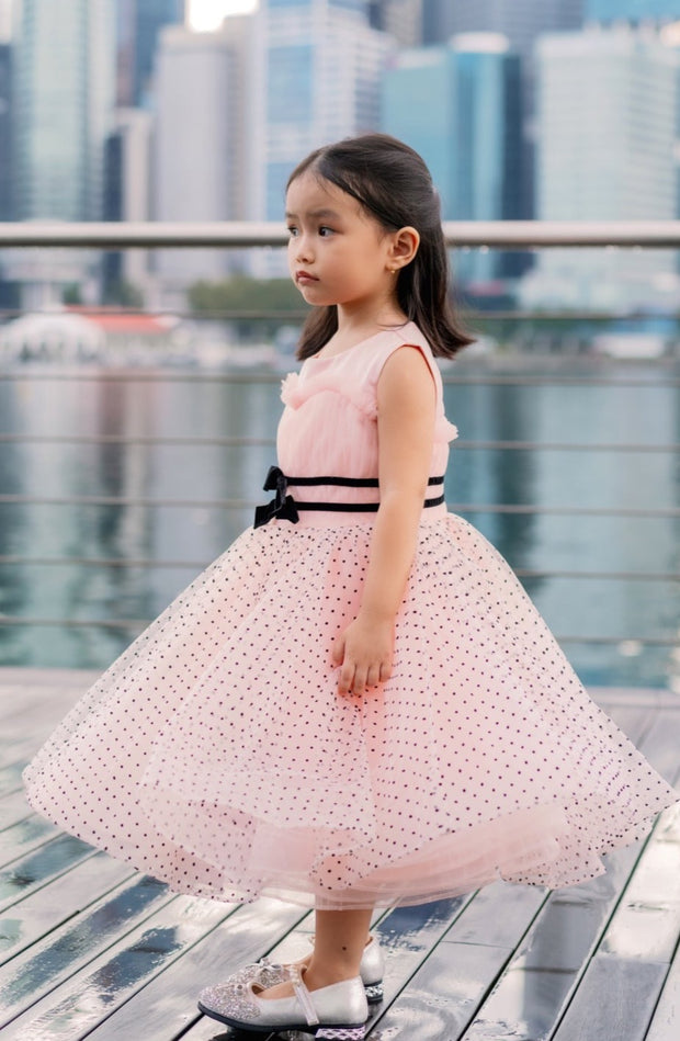Knee-length apricot tulle dress for girls with a voluminous tulle skirt, black polka dot pattern and two cute ribbons at the waistline. Handmade with love. Occasions: Wedding, Birthday party, Prom, Flower girl, Eid, and other events.
