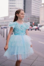 Knee-length girls' tulle dress in a beautiful aquamarine color, with a multi-layer tulle skirt, open back, floral embroidery, and ruffled tulle sleeves. Handmade with love. For special occasions: Wedding, Birthday party, Prom, Flower girl, Eid, and other events.