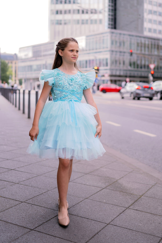 Knee-length girls' tulle dress in a beautiful aquamarine color, with a multi-layer tulle skirt, open back, floral embroidery, and ruffled tulle sleeves. Handmade with love. For special occasions: Wedding, Birthday party, Prom, Flower girl, Eid, and other events.