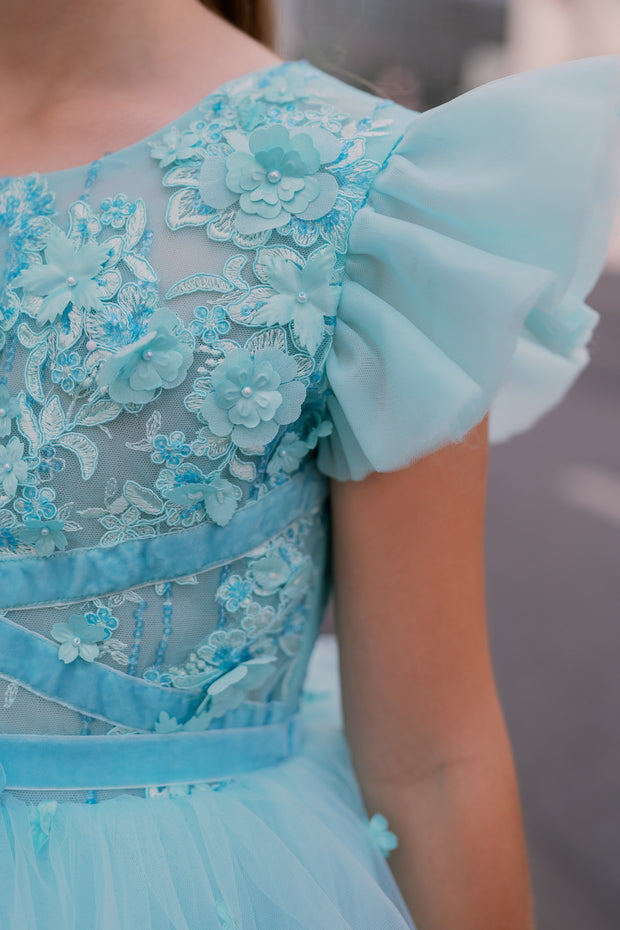 Knee-length girls' tulle dress in a beautiful aquamarine color, with a multi-layer tulle skirt, open back, floral embroidery, and ruffled tulle sleeves. Handmade with love. For special occasions: Wedding, Birthday party, Prom, Flower girl, Eid, and other events.