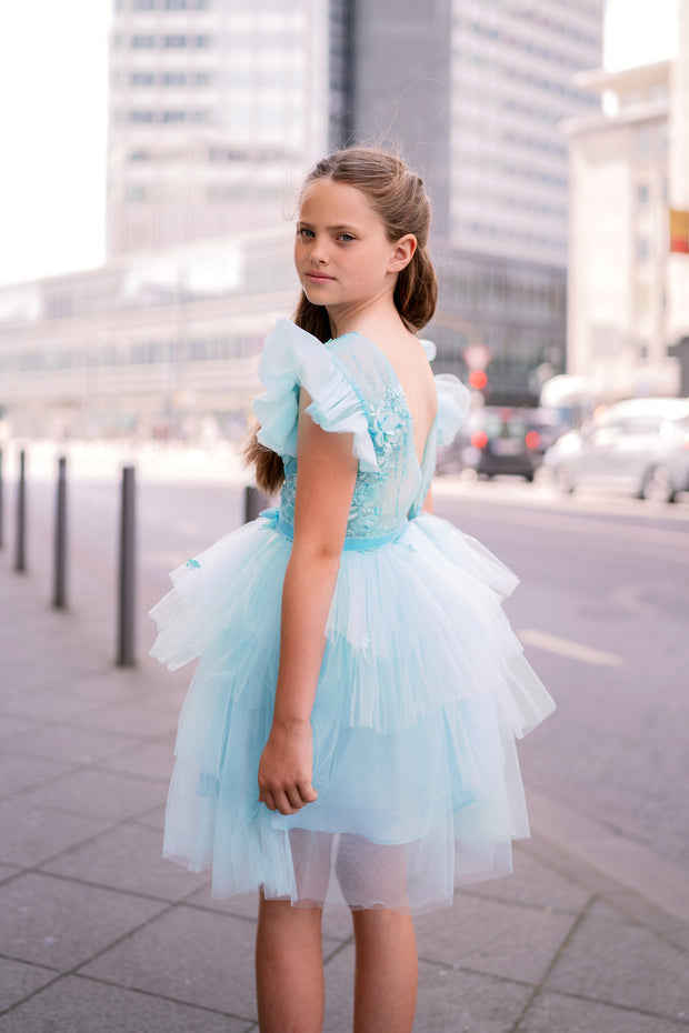 Knee-length girls' tulle dress in a beautiful aquamarine color, with a multi-layer tulle skirt, open back, floral embroidery, and ruffled tulle sleeves. Handmade with love. For special occasions: Wedding, Birthday party, Prom, Flower girl, Eid, and other events.