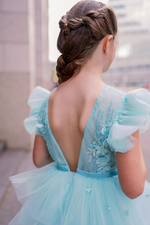 Knee-length girls' tulle dress in a beautiful aquamarine color, with a multi-layer tulle skirt, open back, floral embroidery, and ruffled tulle sleeves. Handmade with love. For special occasions: Wedding, Birthday party, Prom, Flower girl, Eid, and other events.