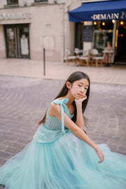 Elegant, a-line girls' dress in a beautiful aquamarine color, featuring a peplum style top embroidered with pearls and decorated with a belt and ribbons. Handmade with love. Occasions: Wedding, Birthday party, Prom, Flower girl, Eid, and other events.