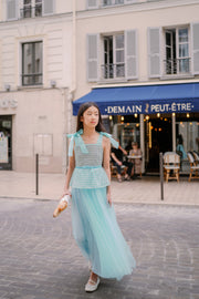 Elegant, a-line girls' dress in a beautiful aquamarine color, featuring a peplum style top embroidered with pearls and decorated with a belt and ribbons. Handmade with love. Occasions: Wedding, Birthday party, Prom, Flower girl, Eid, and other events.