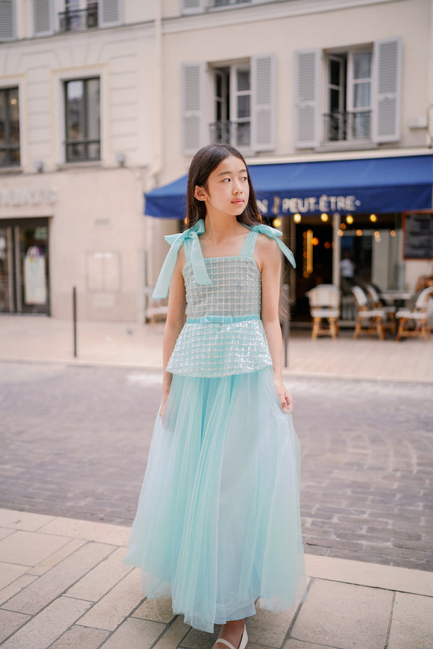 Elegant, a-line girls' dress in a beautiful aquamarine color, featuring a peplum style top embroidered with pearls and decorated with a belt and ribbons. Handmade with love. Occasions: Wedding, Birthday party, Prom, Flower girl, Eid, and other events.
