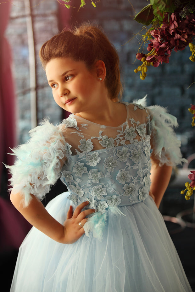 Elegant girls' tulle dress in light blue for any special occasion. Light tulle skirt with an asymmetrical, high-low hemline, top with floral lace and beautiful feather sleeves. Handmade with love. Occasions: Wedding, Birthday party, Prom, Flower girl, Eid, and other events.