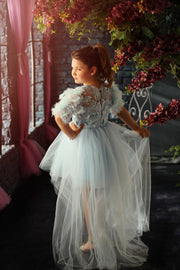 Elegant girls' tulle dress in light blue for any special occasion. Light tulle skirt with an asymmetrical, high-low hemline, top with floral lace and beautiful feather sleeves. Handmade with love. Occasions: Wedding, Birthday party, Prom, Flower girl, Eid, and other events.