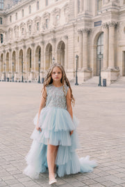 Girls' elegant tulle dress in dusty blue in a high-low hemline style. Tulle skirt, long tulle train, embroidered top and open back create an elegant, modern princess look. Handmade with love. Occasions: Wedding, Birthday party, Prom, Flower girl, Eid, and other events.