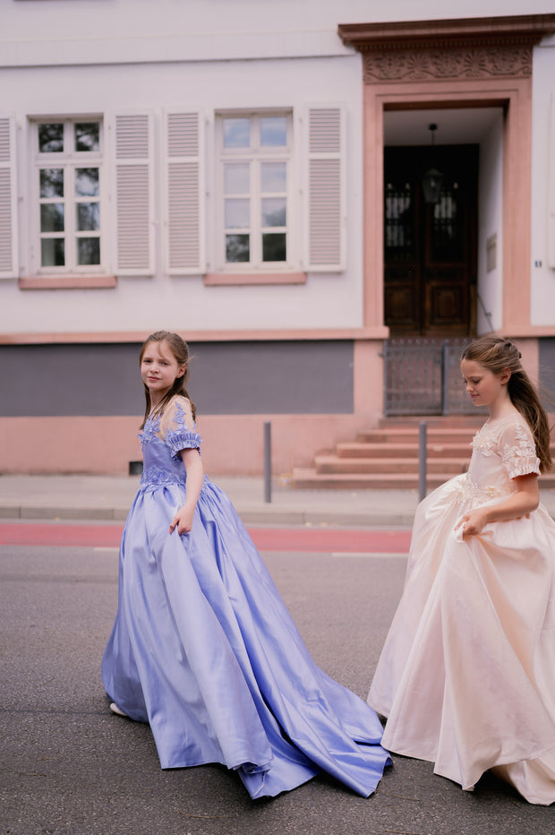 Long, dusty blue princess ball gown with a long, voluminous satin skirt, satin top with short sleeves, 3D floral embroidery and mesh details. Handmade with love. Occasions: Wedding, Birthday party, Prom, Flower girl, Eid, and other events.