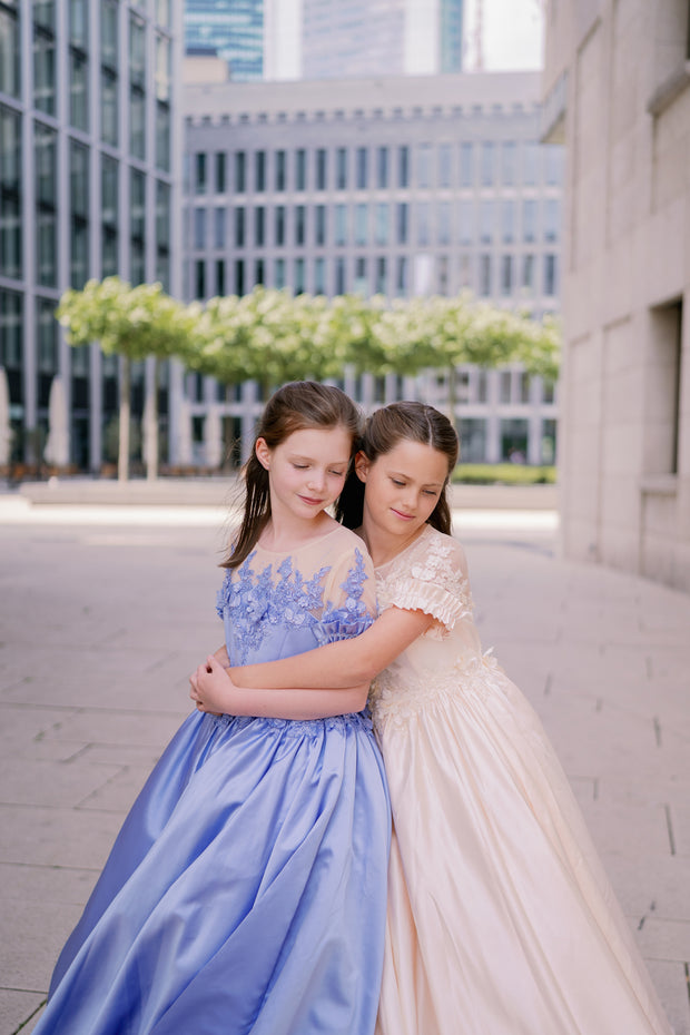 Long, dusty blue princess ball gown with a long, voluminous satin skirt, satin top with short sleeves, 3D floral embroidery and mesh details. Handmade with love. Occasions: Wedding, Birthday party, Prom, Flower girl, Eid, and other events.