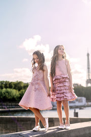 Knee-length girls' dress with an a-line skirt, 3d embroidery, and pearl and feather details. Handmade with love. For special occasions: Wedding, Birthday party, Prom, Flower girl, Eid, and other events.