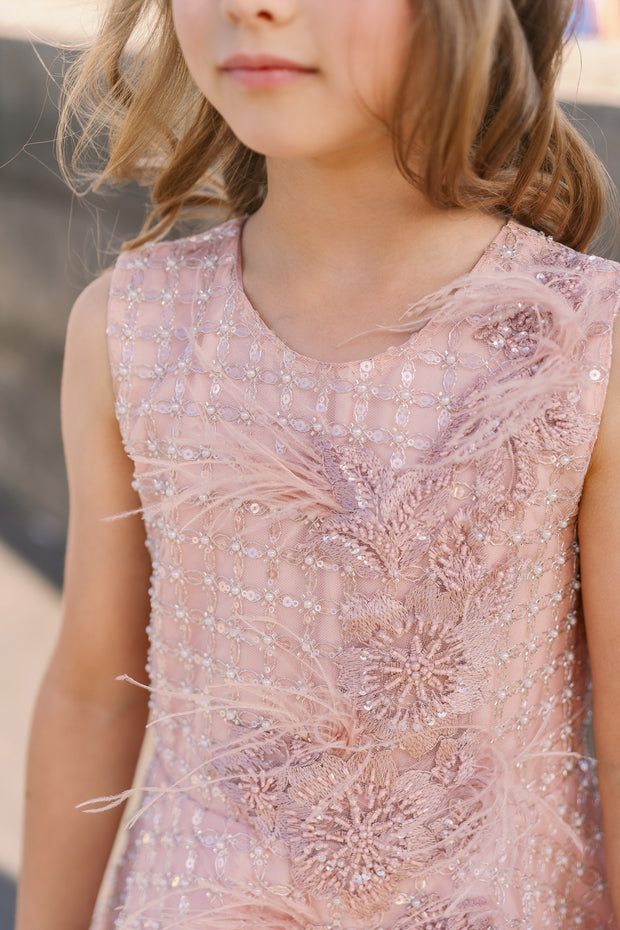 Knee-length girls' dress with an a-line skirt, 3d embroidery, and pearl and feather details. Handmade with love. For special occasions: Wedding, Birthday party, Prom, Flower girl, Eid, and other events.