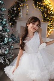 Voluminous, midi white tulle dress with tulle ruffle details, tulle top with sequin embroidery and a big bow accent at the waistline. Handmade with love. For special occasions: Wedding, Birthday party, Prom, Flower girl, Eid, and other events.