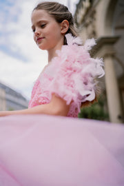 Elegant girls' tulle dress in pink for any special occasion. Light tulle skirt with a high-low hemline, top with floral lace and beautiful feather sleeves. Handmade with love. Occasions: Wedding, Birthday party, Prom, Flower girl, Eid, and other events.