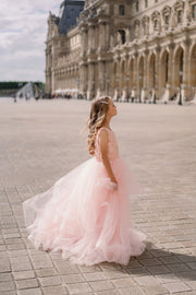 Long, princess dress with a voluminous tulle skirt, and embroiderd top in a beautiful peach colour. For special occasions: Wedding, Birthday party, Prom, Flower girl, Eid, and other events.