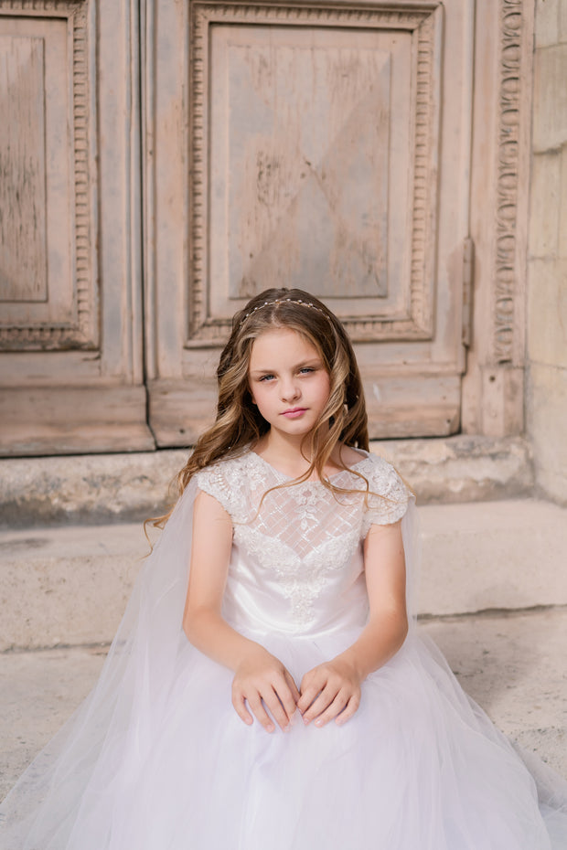 Long, white tulle dress with an a-line skirt, satin top with lace details and long tulle cape. Handmade with love. For special occasions: Wedding, Birthday party, Prom, Flower girl, First Communion, Eid, and other events.