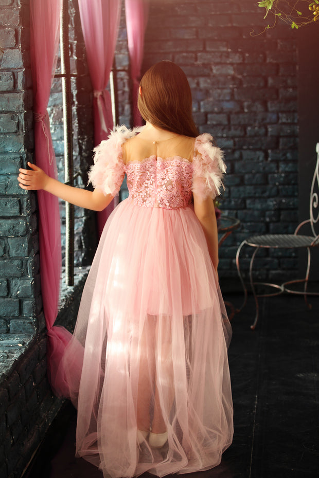 Elegant girls' tulle dress in pink for any special occasion. Light tulle skirt with an asymmetrical, high-low hemline, top with floral lace and beautiful feather sleeves. Handmade with love. Occasions: Wedding, Birthday party, Prom, Flower girl, Eid, Christmas, New Year's Eve, and other events.