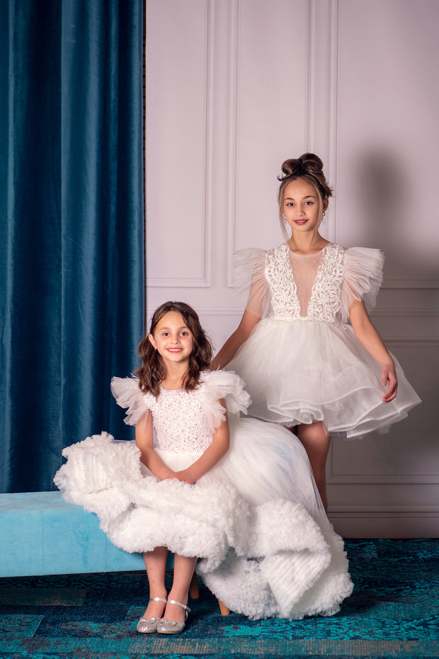 Short white girl tutu dress with a voluminous, ballerina skirt, embroidered tulle top and ruffled tulle sleeves. Handmade girl dress for special occasions: Christmas, New Year's Eve, flower girls, weddings, birthdays, communion.