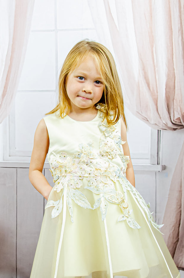 handmade short yellow flower girl's dress with an A-line tulle skirt and pastel color floral embroidery