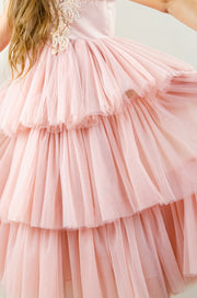 Ankle-length princess dress in a baby pink color with multi-layered tulle skirt, transparent ruffled sleeves and floral embroidery on the front and back satin bodice. Girl dress for special occasions: flower girls, weddings, birthday party, communion, Eid.