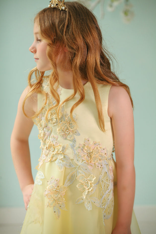 handmade long yellow A-line flower girl dress with a long tulle skirt and hand-embroidered top with flowers, pearls and rhinestones.