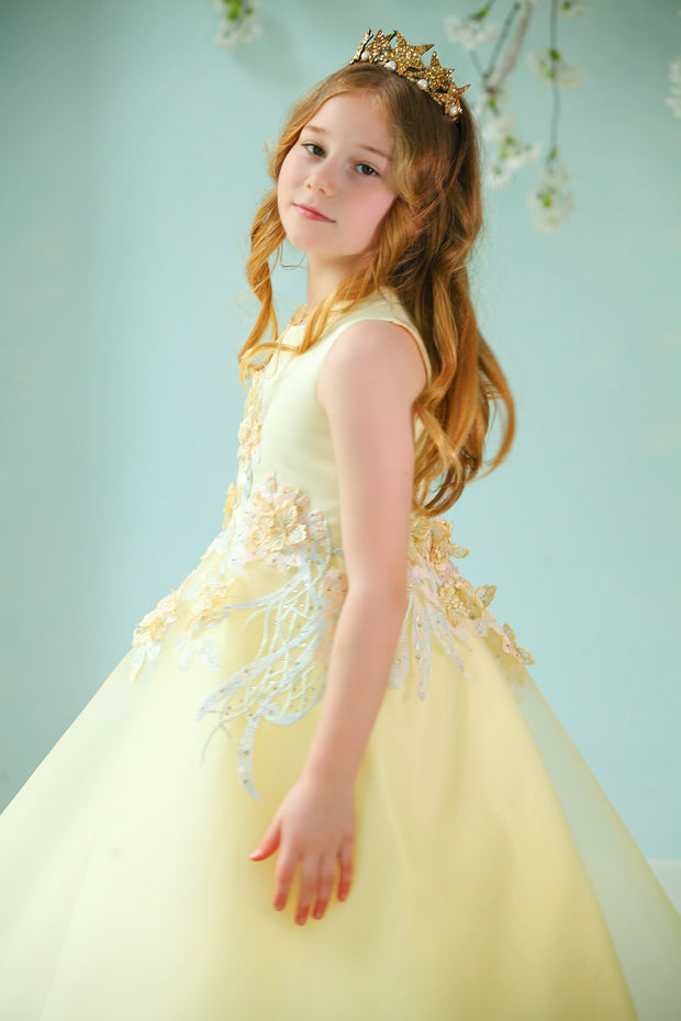 handmade long yellow A-line flower girl dress with a long tulle skirt and hand-embroidered top with flowers, pearls and rhinestones.