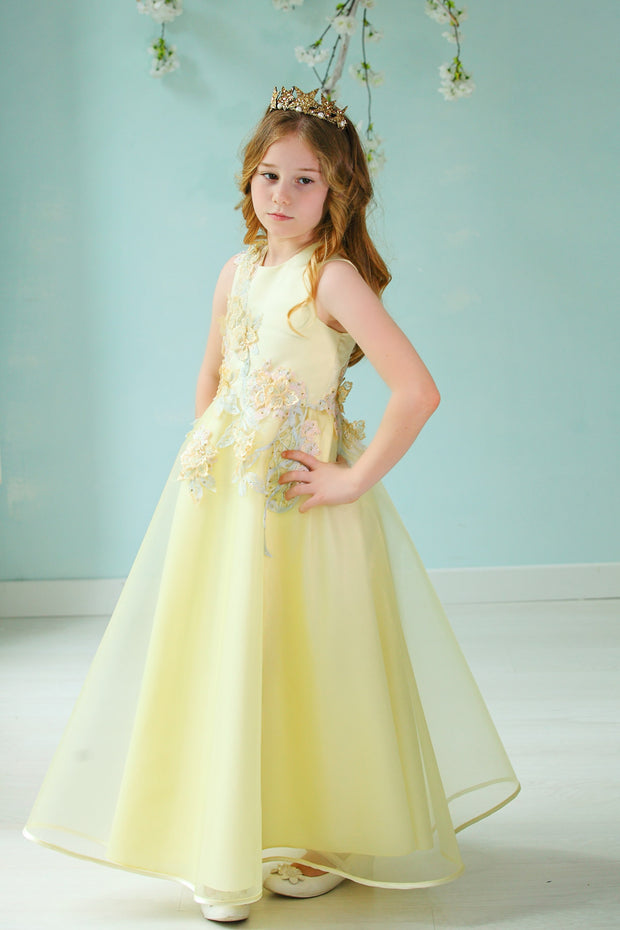 handmade long yellow A-line flower girl dress with a long tulle skirt and hand-embroidered top with flowers, pearls and rhinestones.