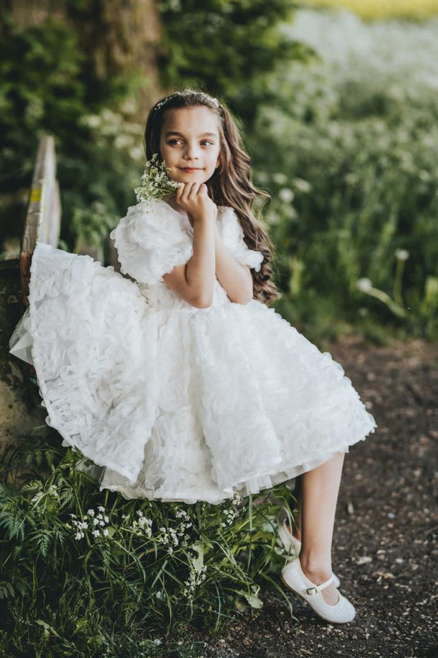 Knee-length white tulle flower girl dress with short sleeves and all-over 3D flower embroidery, for special occasions: Wedding, Birthday party, Prom, Flower girl, Eid, and other events. 