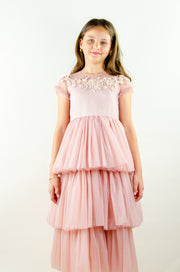 Ankle-length princess dress in a baby pink color with multi-layered tulle skirt, transparent ruffled sleeves and floral embroidery on the front and back satin bodice. Girl dress for special occasions: flower girls, weddings, birthday party, communion, Eid.