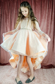Sparkly high-low hemline girl dress with a satin skirt, satin train, long tulle sleeves and all-over rhinestone embellishments. Girl satin dress for special occasions: flower girls, weddings, girl birthday party, junior bridesmaids, Eid, New Year's eve.