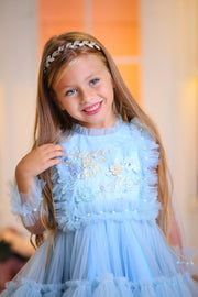 Princess girl dress in baby blue with a voluminous, multi-layer tulle skirt, long, transparent tulle sleeves and satin top with pastel coloured floral embroidery. For Special occasions: Wedding, Birthday party, Prom, Flower girl, Eid, and other events.