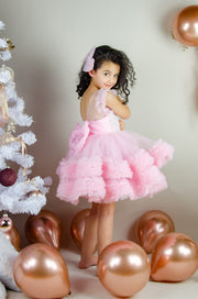 Festive barbie pink girl dress with pearls and tulle ruffles. The dress is for holiday season, Christmas, New Year, weddings, Eid, birthdays, parties, flower girls and other special formal events and occasions.