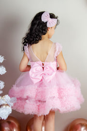 Festive barbie pink girl dress with pearls and tulle ruffles. The dress is for holiday season, Christmas, New Year, weddings, Eid, birthdays, parties, flower girls and other special formal events and occasions.