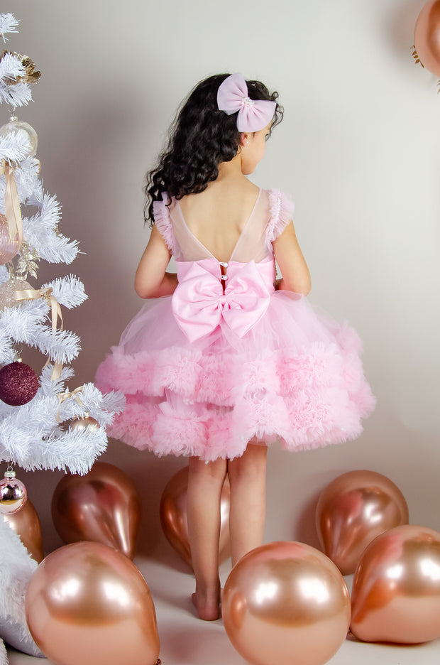 Festive barbie pink girl dress with pearls and tulle ruffles. The dress is for holiday season, Christmas, New Year, weddings, Eid, birthdays, parties, flower girls and other special formal events and occasions.