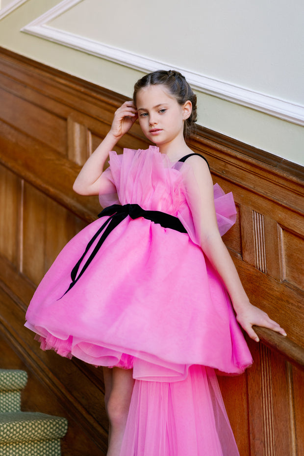 Festive, bright pink high-low hemline girl dress for special occasions. Modern princess girl dress with a bright pink tutu skirt and long tulle train. Black straps and black ribbon at the waistline. Handmade with love. Occasions: Christmas, New Year's Eve, Wedding, Birthday party, Prom, Flower girl, Eid.