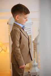 handmade elegant brown ring bearer suit for boys with double buttons, blue shirt and a brown bow tie