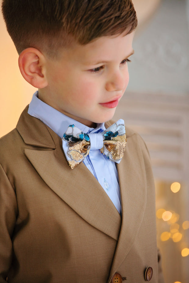 handmade elegant brown ring bearer suit for boys with double buttons, blue shirt and a brown bow tie