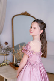 Long, dusty pink princess girls' ball gown with a long, voluminous satin skirt, satin top with short sleeves, 3D floral embroidery and mesh details. Handmade with love. For special occasions: Wedding, Birthday party, Prom, Flower girl, Eid, and other events.