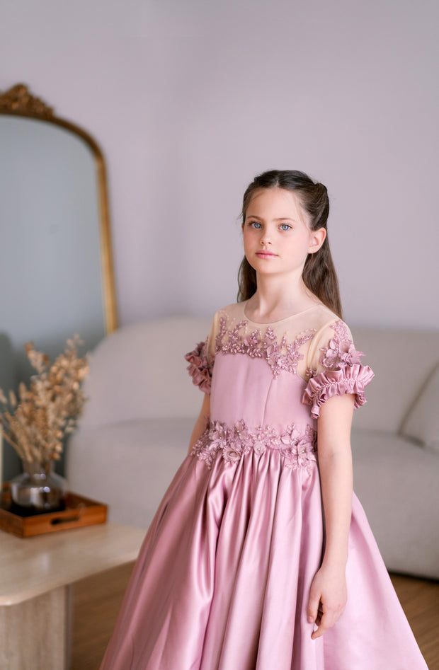 Long, dusty pink princess girls' ball gown with a long, voluminous satin skirt, satin top with short sleeves, 3D floral embroidery and mesh details. Handmade with love. For special occasions: Wedding, Birthday party, Prom, Flower girl, Eid, and other events.