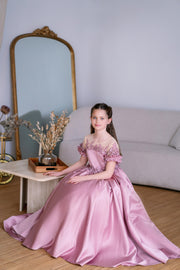 Long, dusty pink princess girls' ball gown with a long, voluminous satin skirt, satin top with short sleeves, 3D floral embroidery and mesh details. Handmade with love. For special occasions: Wedding, Birthday party, Prom, Flower girl, Eid, and other events.