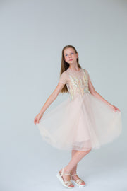 handmade, elegant girl dress with an a-line silhouette, midi length tulle skirt, floral embroidery and short sleeves in soft pastel colours, for flower girls dresses, weddings, birthdays, eid and other special occasions.