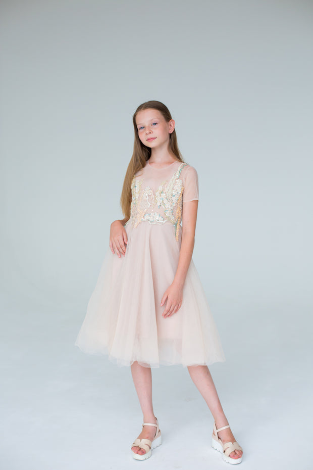 handmade, elegant girl dress with an a-line silhouette, midi length tulle skirt, floral embroidery and short sleeves in soft pastel colours, for flower girls dresses, weddings, birthdays, eid and other special occasions.