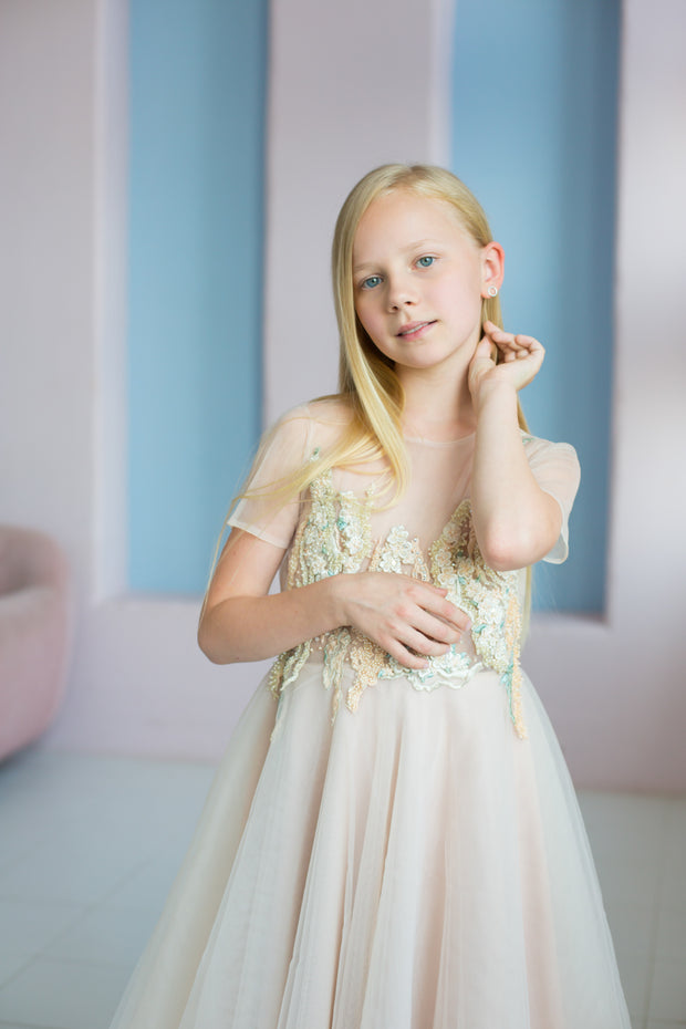 handmade, elegant girl dress with an a-line silhouette, midi length tulle skirt, floral embroidery and short sleeves in soft pastel colours, for flower girls dresses, weddings, birthdays, eid and other special occasions.