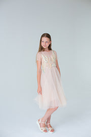 handmade, elegant girl dress with an a-line silhouette, midi length tulle skirt, floral embroidery and short sleeves in soft pastel colours, for flower girls dresses, weddings, birthdays, eid and other special occasions.