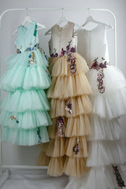 handmade long asymmetrical flower girl dress with a multi-layered tulle skirt in beige, white or mint with flower and sequin embroidery