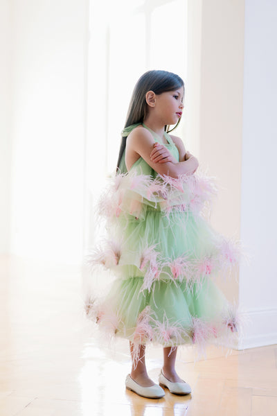 Festive bright green tulle dress for girls with pink feather appliqués. Handmade girl dress for special occasions: Christmas, New Year's Eve, flower girls, weddings, birthdays, communion.